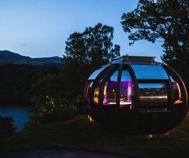 Dining pod at dusk with Scottish loch and mountains backdrop in Pitlochry  ?? ''